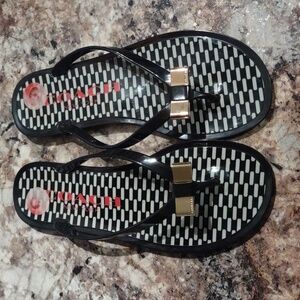 COACH Landon Gold Bow Flip Flops